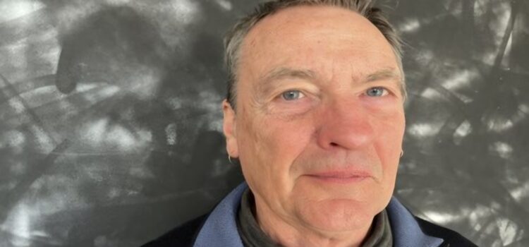 Head and shoulders photograph of Bruce Calderwood, member of the Social Security Advisory Committee